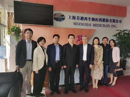 中国药科大学党委书记金能明与HJC黄金城平台首席执行官陈春麟博士